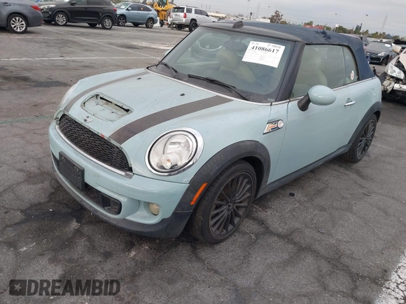 2013 MINI Convertible S с VIN WMWZP3C57DT551118, выставлен на аукционе IAAI как лот 41086617 с пробегом 108 049 миль миль и . История ставок и продаж доступна на DreamBid. Изображение 2.