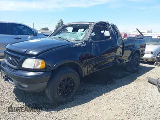 2002 Ford F-150 XL with VIN 2FTRX18LX2CA68793, listed as a IAAI auction lot 42197133 with 143,550 mi miles and . Bid and sale history available at DreamBid. Image 2.