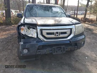2009 Honda Pilot Touring with VIN 5FNYF48939B007471, listed as a IAAI auction lot 41683495 with 189,806 mi miles and . Bid and sale history available at carsss.com. Image 6.