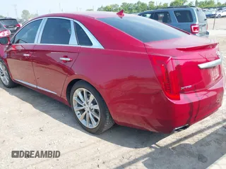 2013 Cadillac XTS Luxury z VIN 2G61P5S34D9139924, wystawiony jako IAAI lot #42504191 z przebiegiem 140 744 mil mil oraz . Historia ofert i sprzedaży dostępna na DreamBid. Obrazek 3.