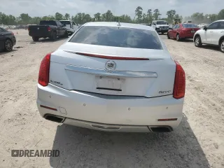2014 Cadillac CTS AWD with VIN 1G6AW5SX4E0123532, listed as a Copart auction lot 55389825 with 114,807 mi miles and Salvage title. Bid and sale history available at DreamBid. Image 6.