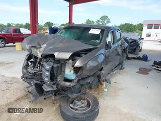 2015 GMC Canyon 2WD SLE with VIN 1GTG5BE30F1221017, listed as a IAAI auction lot 41812666 with 132,277 mi miles and . Bid and sale history available at carsss.com. Image 2.