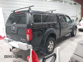 2007 Nissan Frontier SE with VIN 1N6AD09W17C447779, listed as a IAAI auction lot 41362259 with 142,153 mi miles. Bid and sale history available at carsss.com. Image 4.