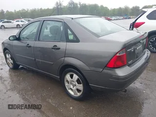2007 Ford Focus S z VIN 1FAFP34N77W336075, wystawiony jako IAAI lot #42325783 z przebiegiem 153 194 mil mil oraz . Historia ofert i sprzedaży dostępna na DreamBid. Obrazek 3.