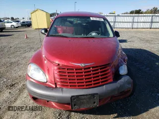 2002 Chrysler PT Cruiser Touring with VIN 3C4FY58B42T292814, listed as a Copart auction lot 81101984 with 57,293 mi miles and Salvage Title. Bid and sale history available at DreamBid. Image 5.