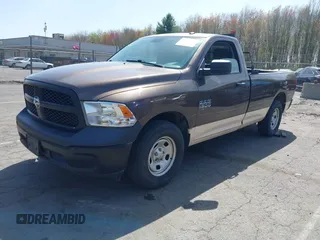 2020 Ram 1500 Tradesman with VIN 3C6JR6DG4LG133162, listed as a IAAI auction lot 42157040 with 84,737 mi miles and . Bid and sale history available at DreamBid. Image 2.