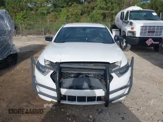 2018 Ford Police Interceptor с VIN 1FAHP2MK1JG107272, выставлен на аукционе IAAI как лот 41908229 с пробегом 100 969 миль миль и . История ставок и продаж доступна на DreamBid. Изображение 12.