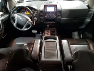 2013 Nissan Titan Pro-4X с VIN 1N6AA0EC1DN301354, выставлен на аукционе Copart как лот 45233045 с пробегом 172 450 миль миль и Списание • Salvage title. История ставок и продаж доступна на DreamBid. Изображение 8.