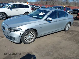2014 BMW 5 Series 528i xDrive with VIN WBA5A7C58ED617131, listed as a IAAI auction lot 41749651 with 117,954 mi miles and . Bid and sale history available at DreamBid. Image 18.