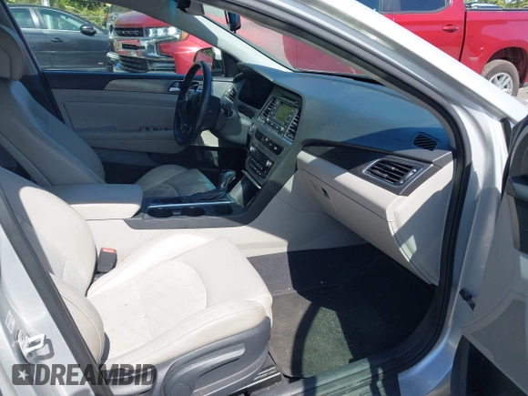 2015 Hyundai Sonata Sport with VIN 5NPE34AF6FH256579, listed as a IAAI auction lot 42052813 with 103,988 mi miles and . Bid and sale history available at DreamBid. Image 5.
