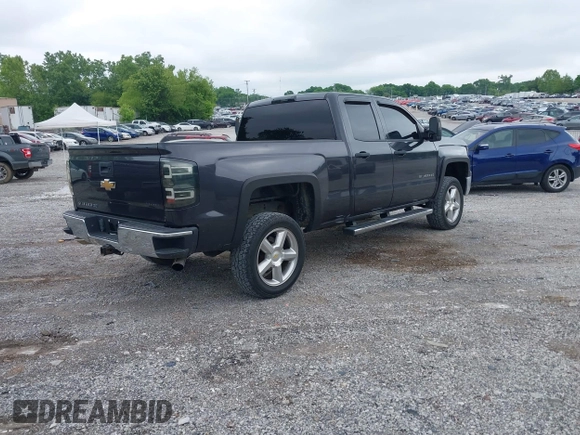 2015 Chevrolet Silverado 1500 LS with VIN 1GCVKPEC8FZ268567, listed as a IAAI auction lot 42237774 with 156,241 mi miles and . Bid and sale history available at DreamBid. Image 4.