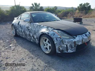 2004 Nissan 350Z Touring with VIN JN1AZ34D44T150578, listed as a IAAI auction lot 41907783 with 198,312 mi miles. Bid and sale history available at carsss.com. Image 1.