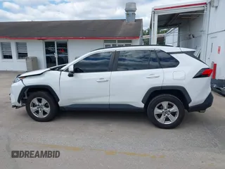 2019 Toyota RAV4 XLE with VIN 2T3W1RFVXKW033696, listed as a IAAI auction lot 42044151 with 126,872 mi miles and . Bid and sale history available at DreamBid. Image 15.