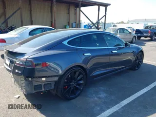 2017 Tesla Model S 100D with VIN 5YJSA1E49HF189008, listed as a IAAI auction lot 42051518 with 49,145 mi miles and . Bid and sale history available at DreamBid. Image 4.