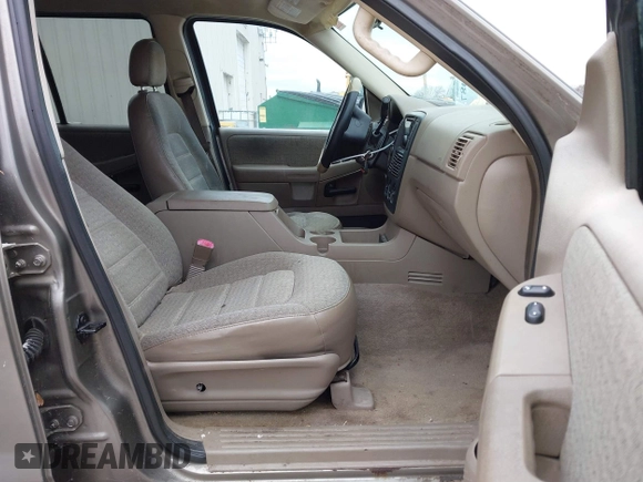 2003 Ford Explorer XLS z VIN 1FMZU72K03UA75695, wystawiony jako IAAI lot #41250087 z przebiegiem 134 795 mil mil oraz . Historia ofert i sprzedaży dostępna na DreamBid. Obrazek 5.