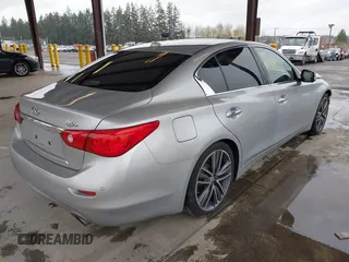 2014 Infiniti Q50 Sport with VIN JN1BV7APXEM670849, listed as a IAAI auction lot 41939363 with 124,766 mi miles and . Bid and sale history available at DreamBid. Image 4.