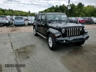 2023 Jeep Wrangler Sport S with VIN 1C4HJXDN6PW618252, listed as a Copart auction lot 55939455 with 69,681 mi miles and Salvage title. Bid and sale history available at DreamBid. Image 14.