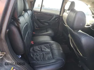2003 Jeep Grand Cherokee Limited z VIN 1J8GW58N73C502929, wystawiony jako Copart lot #79472734 z przebiegiem 231 176 mil mil oraz Szkoda całkowita • Salvage title. Historia ofert i sprzedaży dostępna na DreamBid. Obrazek 11.