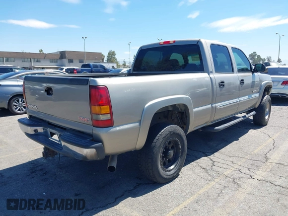 2003 GMC Sierra 2500HD SLT with VIN 1GTHK231X3F243264, listed as a IAAI auction lot 42606442 with 166,770 mi miles and . Bid and sale history available at DreamBid. Image 4.