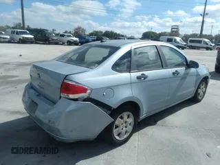 2008 Ford Focus S with VIN 1FAHP34N68W149713, listed as a IAAI auction lot 35985907 with 139,029 mi miles. Bid and sale history available at carsss.com. Image 4.
