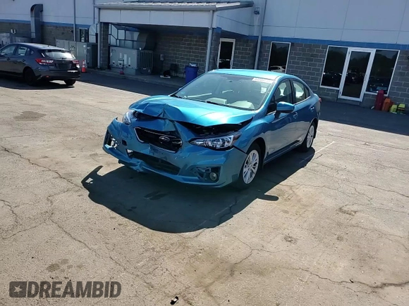 2018 Subaru Impreza Premium with VIN 4S3GKAD63J3605854, listed as a Copart auction lot 54986795 with 59,119 mi miles and Salvage title. Bid and sale history available at DreamBid. Image 13.