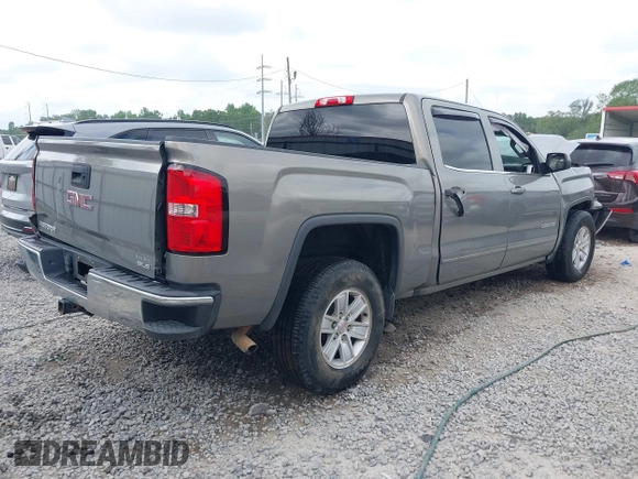 2017 GMC Sierra 1500 SLE z VIN 3GTP1MEC0HG230277, wystawiony jako IAAI lot #41997297 z przebiegiem Nie podano mil oraz . Historia ofert i sprzedaży dostępna na DreamBid. Obrazek 4.