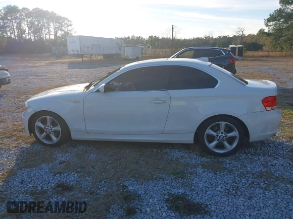2009 BMW 1 Series 128i with VIN WBAUP93579VF49106, listed as a IAAI auction lot 41443690 with Not provided miles and . Bid and sale history available at DreamBid. Image 14.