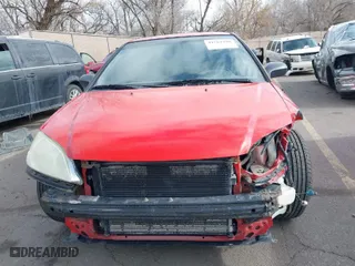 2005 Honda Civic LX with VIN 1HGEM21595L079255, listed as a IAAI auction lot 41561580 with 158,207 mi miles. Bid and sale history available at carsss.com. Image 13.