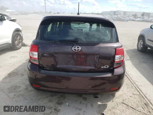 2012 Scion xD with VIN JTKKU4B45C1024533, listed as a Copart auction lot 63619703 with 126,806 mi miles and Non Repairable. Bid and sale history available at DreamBid. Image 6.