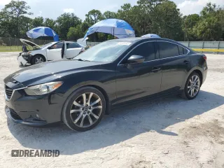 2014 Mazda 6 i Grand Touring с VIN JM1GJ1W52E1105161, выставлен на аукционе Copart как лот 58409345 с пробегом 239 710 миль миль и Списание • Salvage title. История ставок и продаж доступна на DreamBid. Изображение 1.