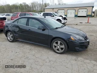 2010 Pontiac G6 1SH z VIN 1G2ZA5EK2A4153702, wystawiony jako Copart lot #53890375 z przebiegiem 159 496 mil mil oraz Szkody całkowita. Historia ofert i sprzedaży dostępna na DreamBid. Obrazek 4.