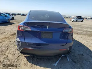 2021 Tesla Model Y Long Range with VIN 5YJYGAEE3MF231751, listed as a Copart auction lot 46415105 with 78,172 mi miles and Salvage Title. Bid and sale history available at carsss.com. Image 6.