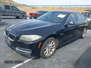 2014 BMW 5 Series 535i with VIN WBA5B1C54ED476763, listed as a IAAI auction lot 41590236 with 115,048 mi miles and . Bid and sale history available at DreamBid. Image 2.