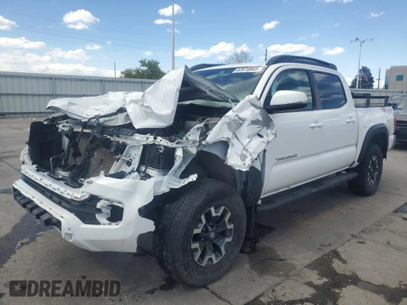 2018 Toyota Tacoma SR with VIN 5TFCZ5AN3JX128204, listed as a Copart auction lot 53970865 with 76,986 mi miles and Salvage Title. Bid and sale history available at DreamBid. Image 1.