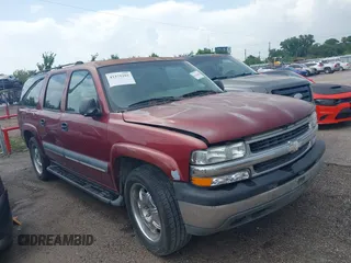 2002 Chevrolet Suburban LT z VIN 1GNEC16Z72J252681, wystawiony jako IAAI lot #42375392 z przebiegiem 312 135 mil mil oraz . Historia ofert i sprzedaży dostępna na DreamBid. Obrazek 1.