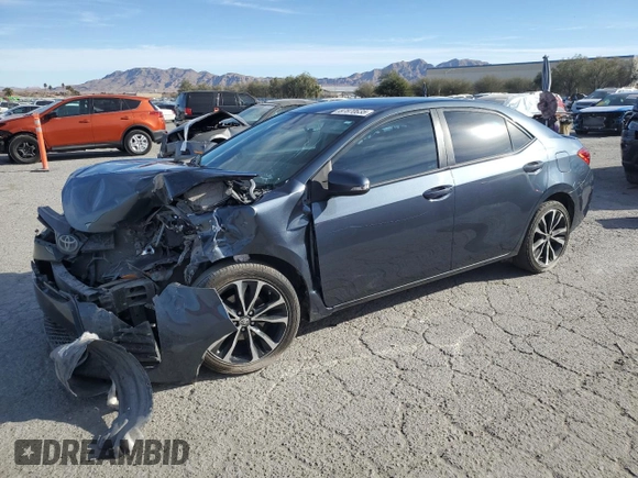 2019 Toyota Corolla L with VIN 2T1BURHE4KC184532, listed as a Copart auction lot 87870635 with 82,357 mi miles and Salvage Title. Bid and sale history available at DreamBid. Image 1.