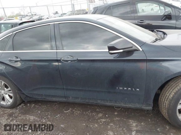 2014 Chevrolet Impala LT with VIN 2G1125S35E9303056, listed as a IAAI auction lot 42019162 with 190,427 mi miles and . Bid and sale history available at DreamBid. Image 12.