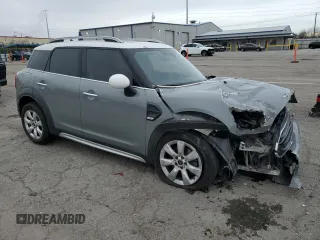 2017 MINI Countryman Cooper with VIN WMZYS7C31H3E06457, listed as a Copart auction lot 49351315 with 77,461 mi miles and Salvage title. Bid and sale history available at DreamBid. Image 4.