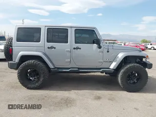 2018 Jeep Wrangler Unlimited Sahara with VIN 1C4BJWEG6JL817231, listed as a IAAI auction lot 42225248 with 68,015 mi miles and . Bid and sale history available at DreamBid. Image 14.