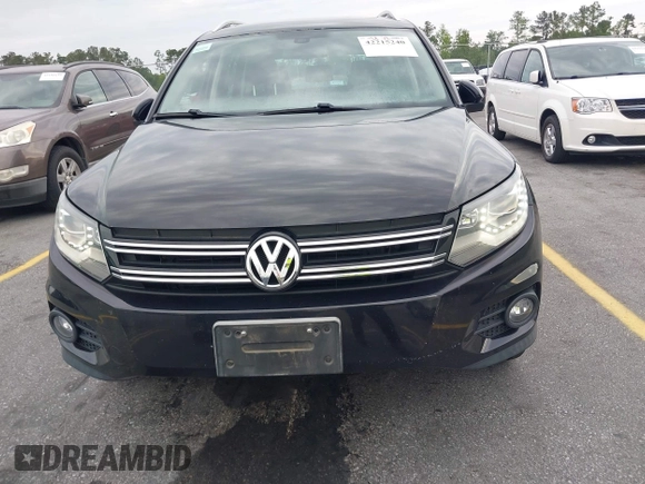 2012 Volkswagen Tiguan S with VIN WVGBV7AX6CW592242, listed as a IAAI auction lot 42215240 with 158,852 mi miles and . Bid and sale history available at DreamBid. Image 6.