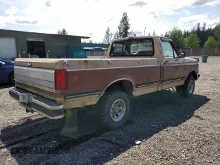 1987 Ford F-150 с VIN 1FTEF14H2HKB06296, выставлен на аукционе Copart как лот 57914035 с пробегом 40 931 миль миль и Чистый • Clean title. История ставок и продаж доступна на DreamBid. Изображение 3.