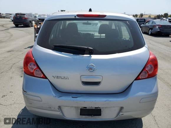 2010 Nissan Versa S with VIN 3N1BC1CP1AL408030, listed as a Copart auction lot 59906325 with 125,243 mi miles and Salvage title. Bid and sale history available at DreamBid. Image 6.
