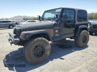 1999 Jeep Wrangler Sahara z VIN 1J4FY49S8XP472733, wystawiony jako Copart lot #58174915 z przebiegiem 170 838 mil mil oraz Szkoda całkowita • Salvage title. Historia ofert i sprzedaży dostępna na DreamBid. Obrazek 1.