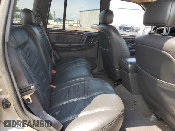 1998 Jeep Grand Cherokee Limited with VIN 1J4GZ88Z9WC148445, listed as a Copart auction lot 65961744 with 180,067 mi miles and Clean Title. Bid and sale history available at carsss.com. Image 10.