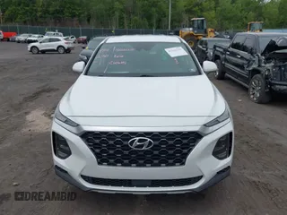 2019 Hyundai Santa Fe SE z VIN 5NMS2CADXKH005960, wystawiony jako IAAI lot #42341142 z przebiegiem 71 617 mil mil oraz . Historia ofert i sprzedaży dostępna na DreamBid. Obrazek 12.