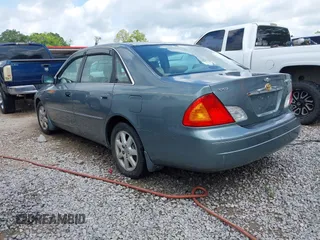 2001 Toyota Avalon XL z VIN 4T1BF28B01U138040, wystawiony jako IAAI lot #42320480 z przebiegiem 220 086 mil mil oraz . Historia ofert i sprzedaży dostępna na DreamBid. Obrazek 3.