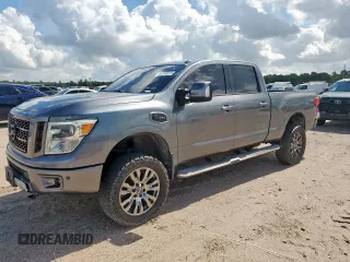2016 Nissan Titan Platinum Reserve with VIN 1N6BA1F49GN503106, listed as a Copart auction lot 62740215 with 155,659 mi miles and Clean title. Bid and sale history available at DreamBid. Image 1.