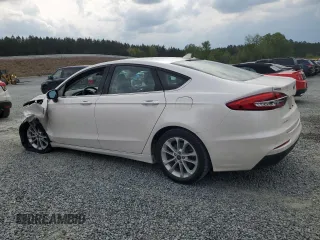 2020 Ford Fusion Hybrid SE with VIN 3FA6P0LUXLR184992, listed as a Copart auction lot 52674565 with 59,742 mi miles and Salvage Title. Bid and sale history available at carsss.com. Image 2.