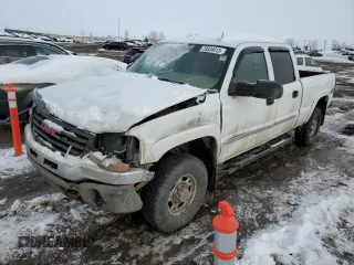 2003 GMC Sierra 1500HD SLE z VIN 1GTGK13UX3F218073, wystawiony jako Copart lot #73334613 z przebiegiem 222 753 mil mil oraz Szkody całkowita. Historia ofert i sprzedaży dostępna na DreamBid. Obrazek 1.