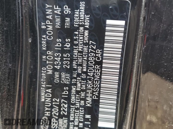 2013 Hyundai Genesis Coupe Track z VIN KMHHU6KJ4DU089727, wystawiony jako Copart lot #50002495 z przebiegiem 99 869 mil mil oraz Szkoda całkowita • Salvage title. Historia ofert i sprzedaży dostępna na DreamBid. Obrazek 13.